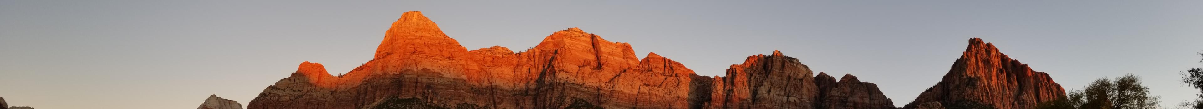 Panoramic view of sunset on red rocks